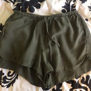 green flowy shorts